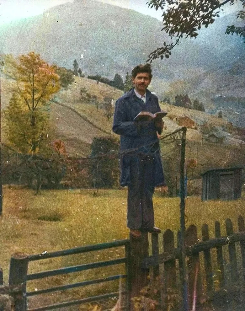 A man on a fence