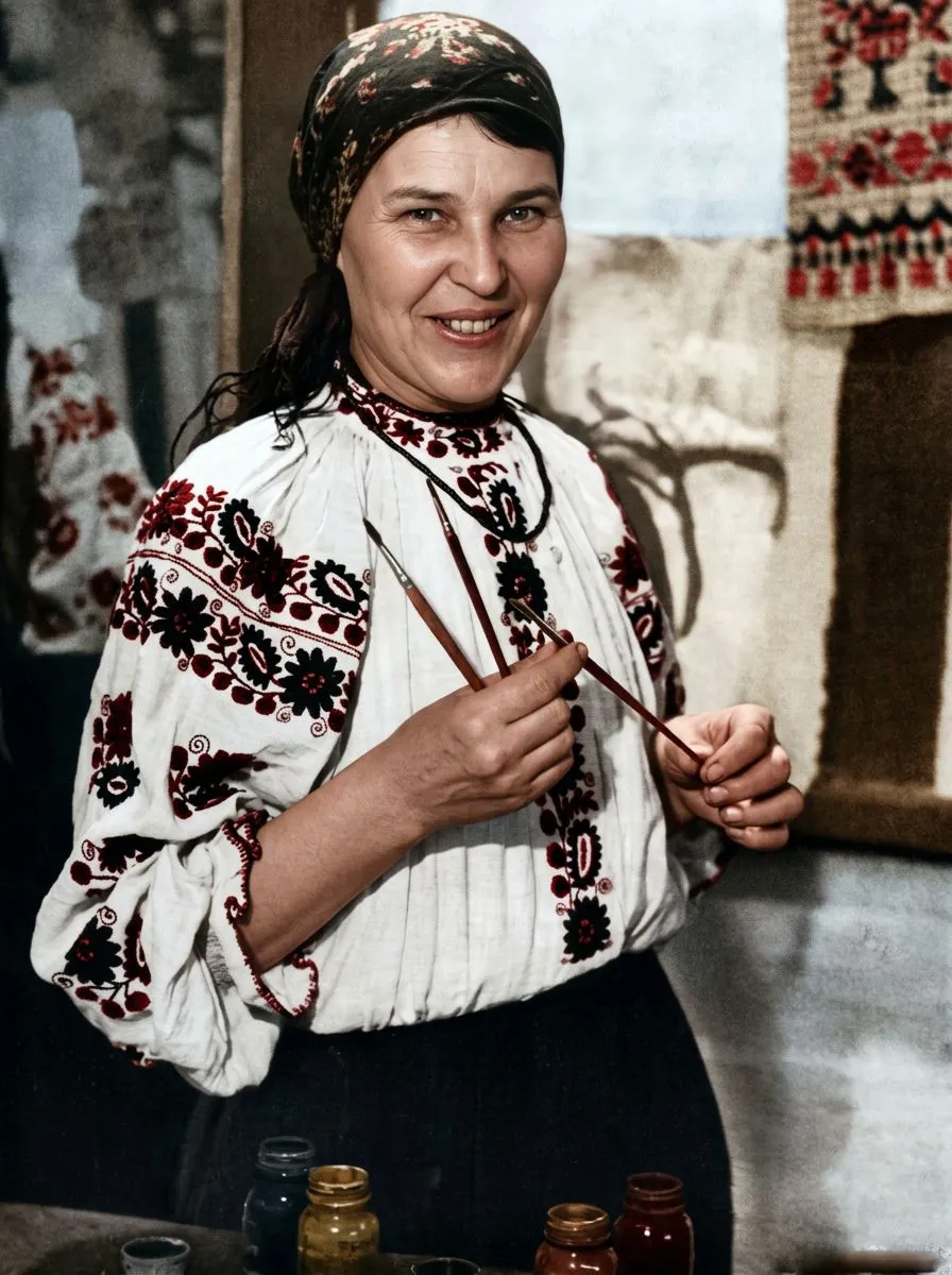 Maria Prymachenko at work in a vyshyvanka